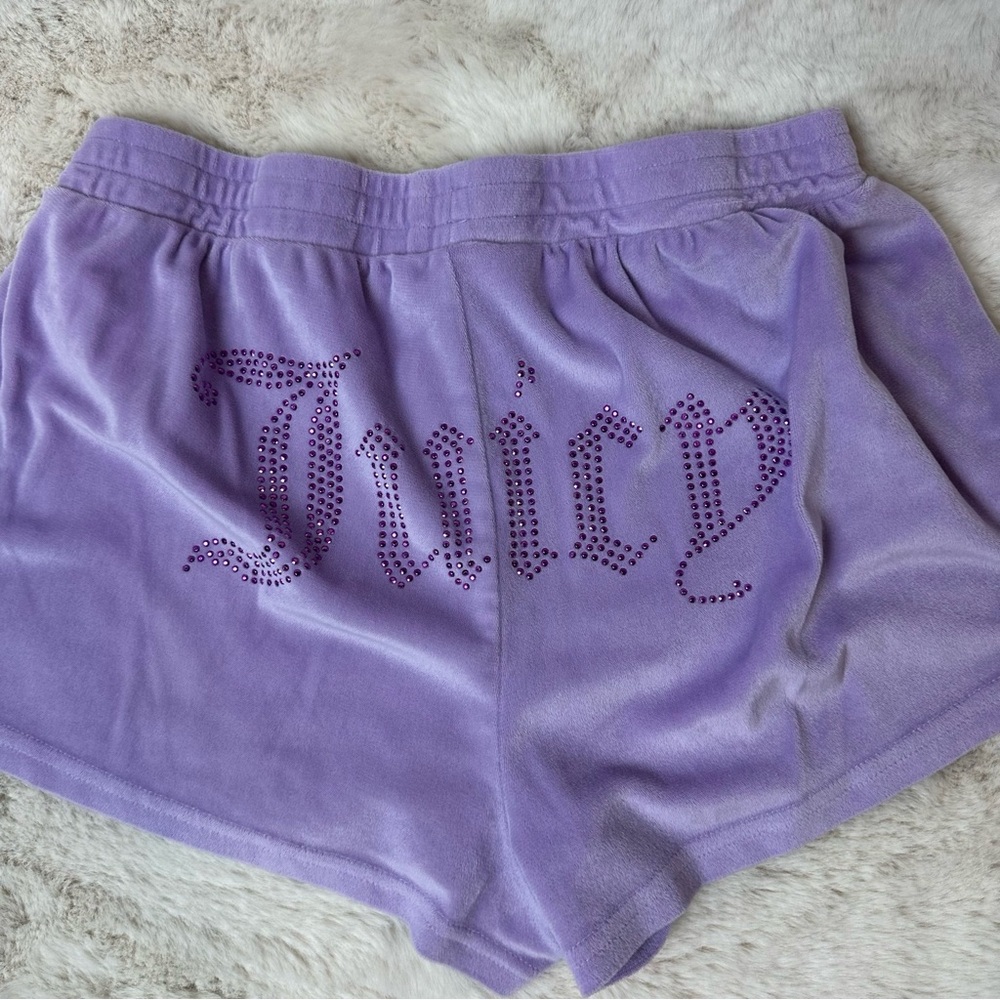 Juicy Couture Big Bling velour track shorts in a freesia (purple/lilac) color.